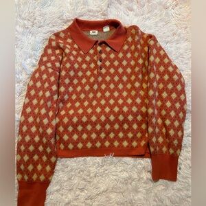 orange levis sweater